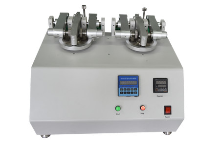 Principles and Applications of the Double Head Taber Abrasion Tester